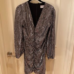 Mid-length long sleeve dress and stretchy material